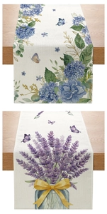 Detailed texture of linen table runner with blue hydrangea and purple lavender prints
