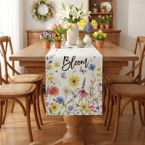Floral table runner with sunflower print and Bloom text for spring dining decor