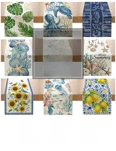 Selection of digital print linen table runners with floral, lemon, and sea life patterns