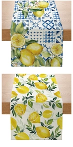 Detail of Mediterranean lemon pattern table runner with citrus motifs on wooden surface