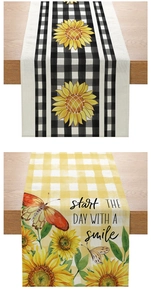 Close-up of cotton linen table runner with sunflower patterns and buffalo check textures