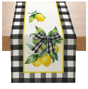 Detailed texture of rustic linen table runner with lemons and gingham check patterns