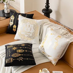 Eid Ramadan throw pillow covers with gold moon and star patterns on sofa set
