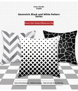Close-up of three black and white geometric peach skin pillowcases weighing 45g each