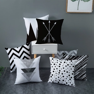 Set of 7 modern geometric throw pillow covers in black white and grey for minimalist sofas