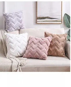 Detail of plush throw pillows featuring textured wavy patterns in a cozy home setting