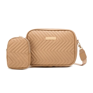 Chic quilted beige crossbody bag set with adjustable strap and golden hardware