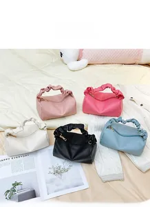 Multiple pleated soft leather pillow bags in blue, black, white, pink and rose colors