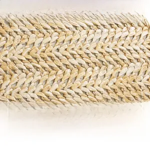 Close-up of high-quality woven straw fabric texture on a beige crossbody lady bag