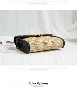 Detail of hand-woven straw crossbody bag with black leather trim and golden twist lock