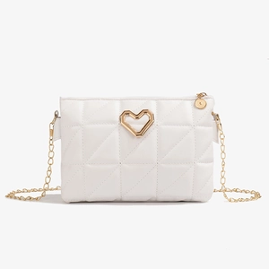 Elegant white quilted crossbody bag with golden heart clasp and thin chain strap