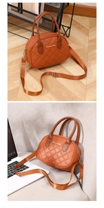 Close-up of quilted leather handbag showing golden logo and fine stitching details