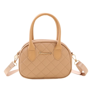 Beige quilted handbag with detachable wide shoulder strap and gold logo detail