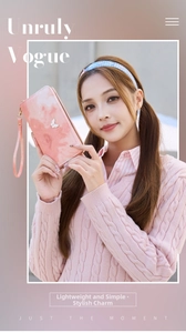 Detail of pink marble pattern wallet with butterfly ornament and wrist strap