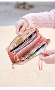 Detail of pink gradient wallet showing multi-card slots and organ style inner layers