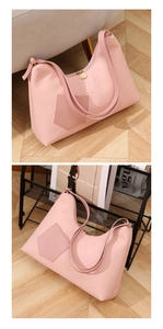 Detailed view of pink quilted hobo bag with wavy stitching and spacious tote design