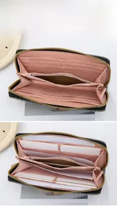 Detail of long sequin wallet interior featuring 12 card slots and a zipper coin pocket