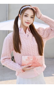 Detail of pink marble gradient wallet with elegant butterfly metal ornament