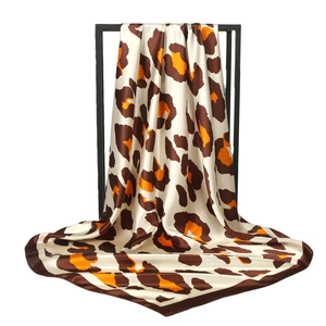 Satin leopard print silk scarf for women featuring a bold brown and orange animal pattern