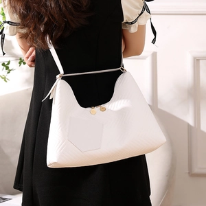 White V-quilted PU leather crossbody bag with dual gold zippers and sleek strap