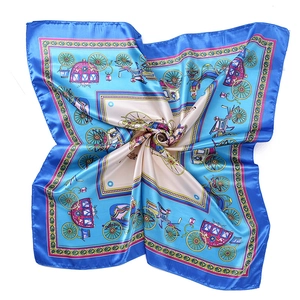Royal blue and beige satin square scarf featuring vintage horse carriage pattern and floral accents