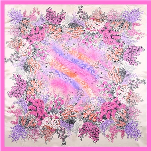 Detailed top view of 90cm satin square scarf with vibrant floral print and pink borders