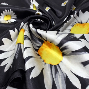 90x90cm satin scarf featuring large white daisy floral prints on a sleek black background
