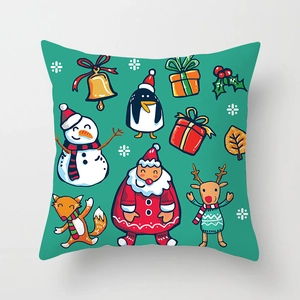 Close-up of green Christmas pillowcase featuring hand-drawn Santa and Reindeer patterns