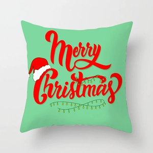 Detail of Christmas pillow cover with Merry Christmas text and festive light illustrations