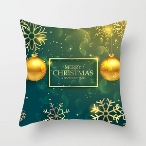 Detail of Christmas pillowcase with gold snowflake prints on dark green peach skin fabric