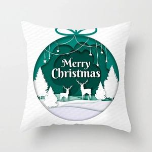 Detail showing high-quality white square pillow cover with green reindeer forest print