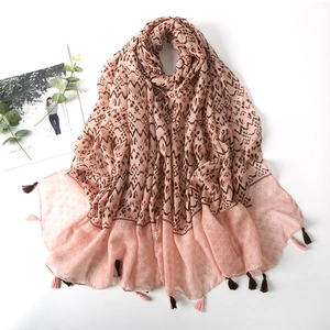 Bohemian light pink cotton linen scarf with ethnic patterns and tassel fringe details