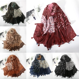 Detailed grid showing paisley printed scarves with colorful fringe in six vibrant colors
