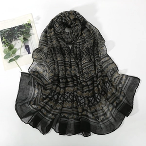 Detail shot of breathable cotton-linen scarf with bohemian geometric wave pattern
