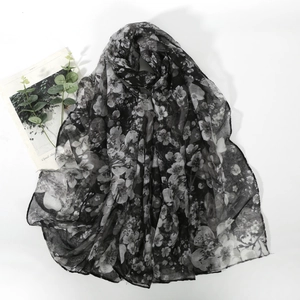 Elegant black and white floral print voile scarf with lightweight breathable texture