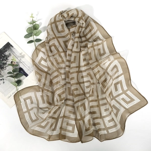 Brown georgette silk scarf with white geometric pattern, stylish sun protection shawl