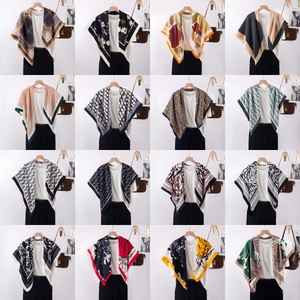 Detailed grid view of 16 different zebra and floral pattern silk scarves for women