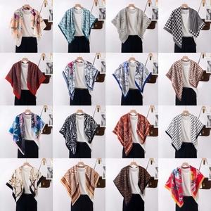 Detailed grid showing sixteen different silk scarves featuring varied patterns and elegant prints