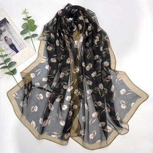 Elegant georgette long scarf with tulip print and contrasting borders on white backdrop
