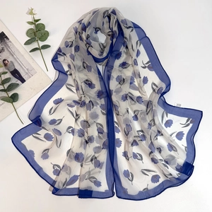 Long tulip print georgette scarf with blue floral pattern and smooth silk feeling
