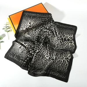 Leopard print silk square scarf in black and white with premium gift box packaging