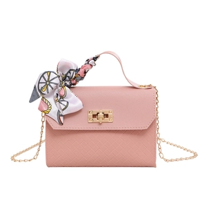 Pink crossbody bag with diamond weave texture, gold chain and vintage scarf handle