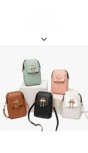 Detailed view of quilted faux leather crossbody bags in five stylish colors with swan charms
