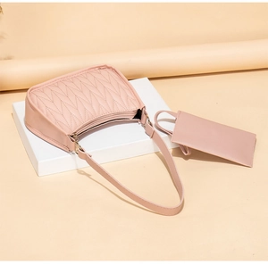 Pink quilted shoulder bag set with V-shaped stitching and golden zipper hardware detail