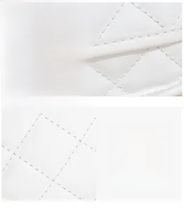 Close-up of quilted pattern stitching and premium white leather texture on chain bag
