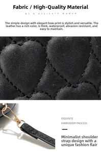 Close-up of black heart-quilted waterproof leather texture and gold metal hardware