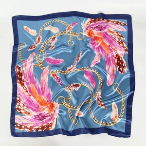 Blue satin silk scarf with elegant chain and colorful feather patterns in 90x90cm size