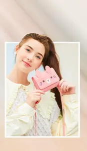 Detailed close-up of a pink mini crossbody bag with a cute cartoon rabbit face print