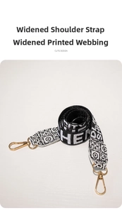 Close-up of wide jacquard replacement shoulder strap with floral patterns and gold hooks