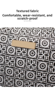 Detail of checkered pattern fabric and gold metal plaque on crossbody camera bag